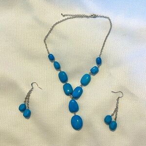 Turquoise colored Park Lane necklace and earrings.